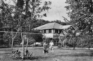 Colin Anne and John Campbell in fez, Sarasawatty Estate, between Bidor and Telok Anson, Perak, FMS