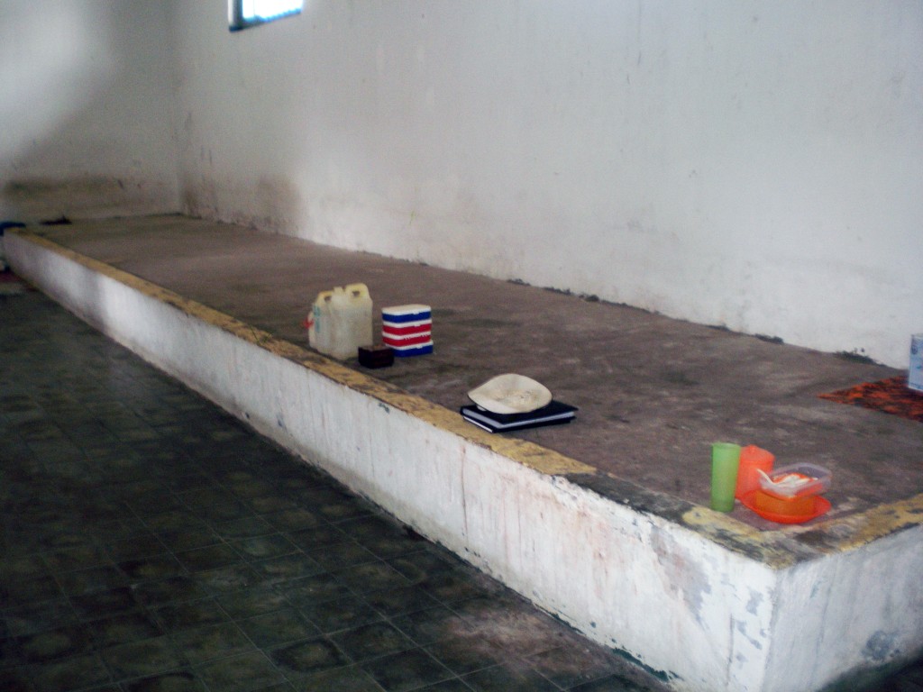 Concrete beds, Muntok Jail. Many men slept on this platform